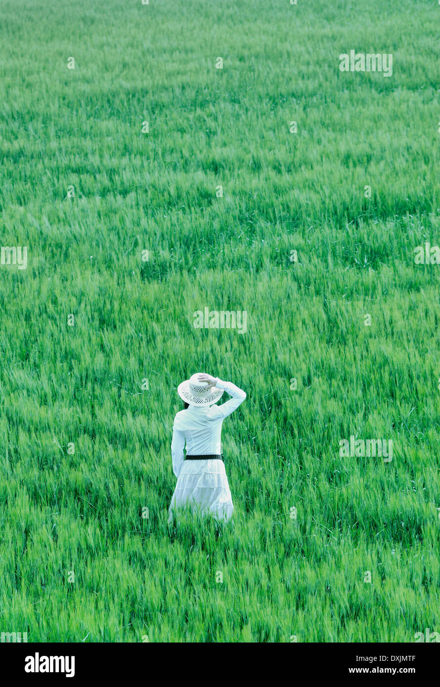 Woman standing wearing hat hi-res stock photography and images - Alamy