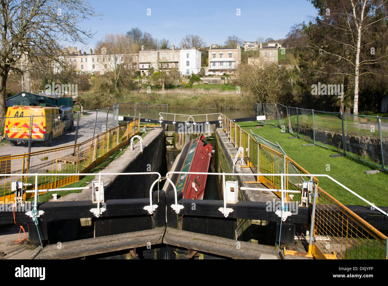 A capsized narrow boat on the Kennet and Avon Canal at Abbey View Lock Bath: Stock Photo