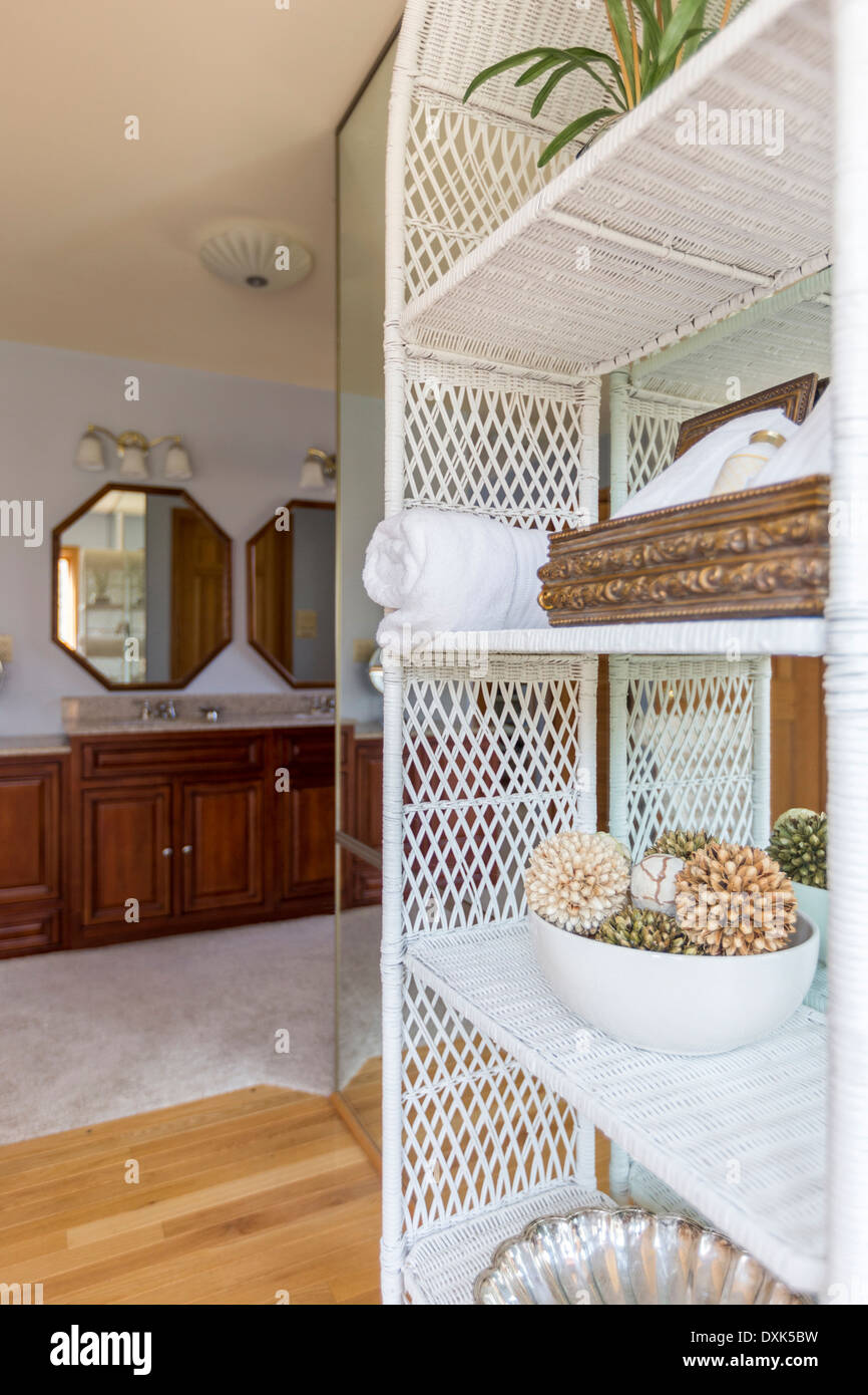 Wicker shelves outside bathroom Stock Photo Alamy