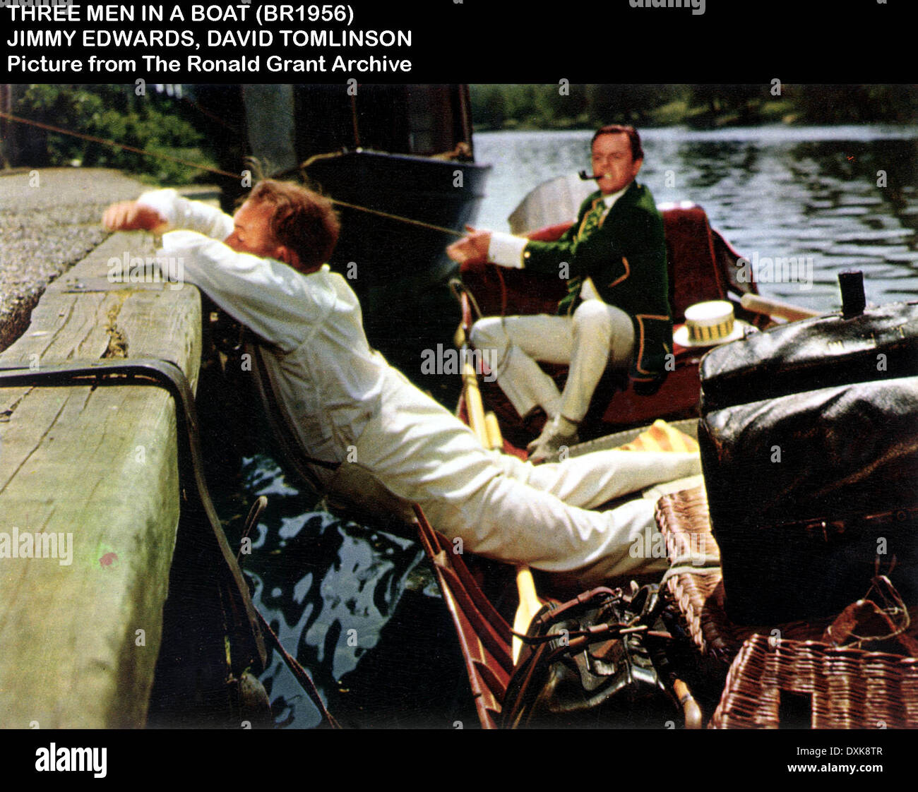 THREE MEN IN A BOAT Stock Photo