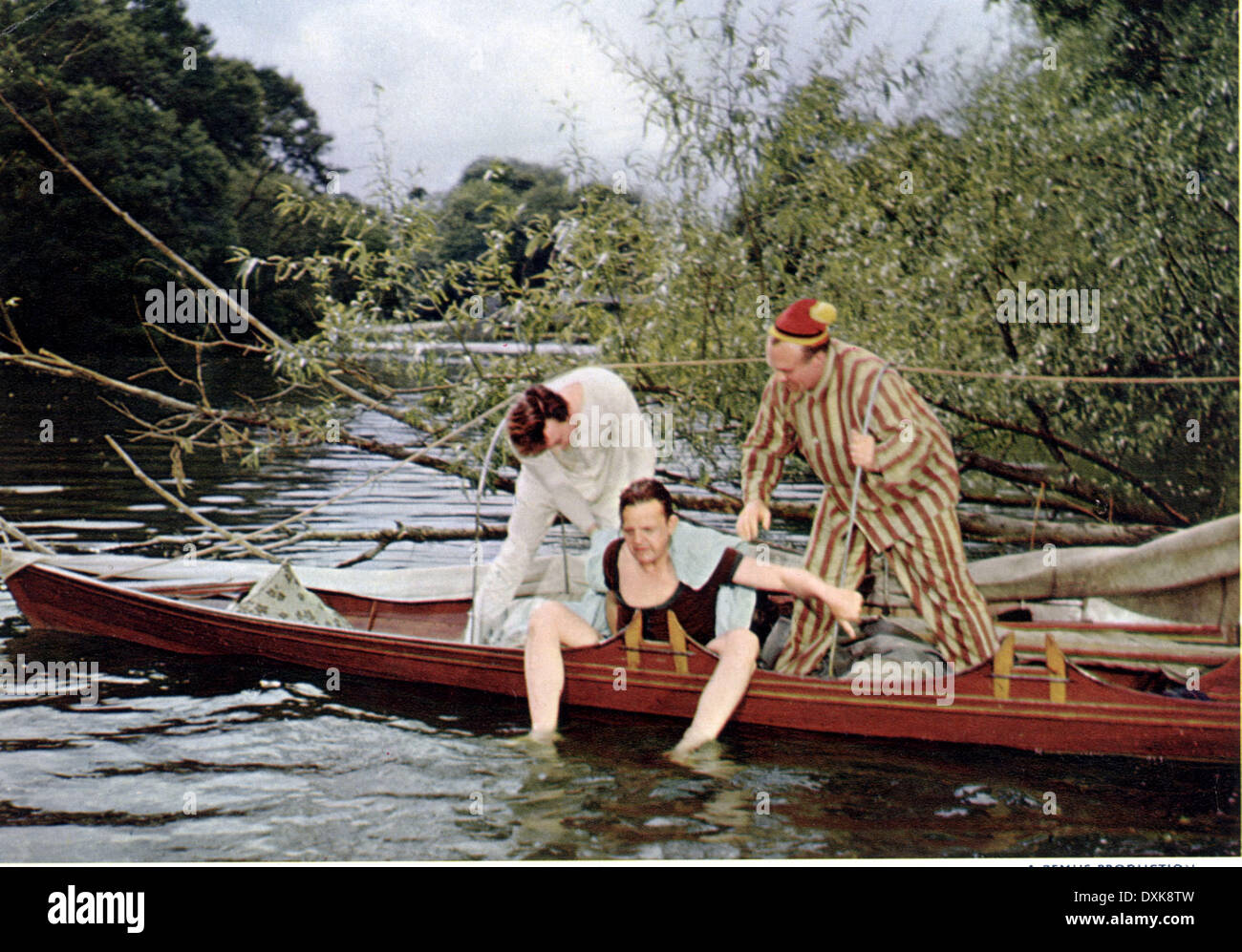 THREE MEN IN A BOAT Stock Photo