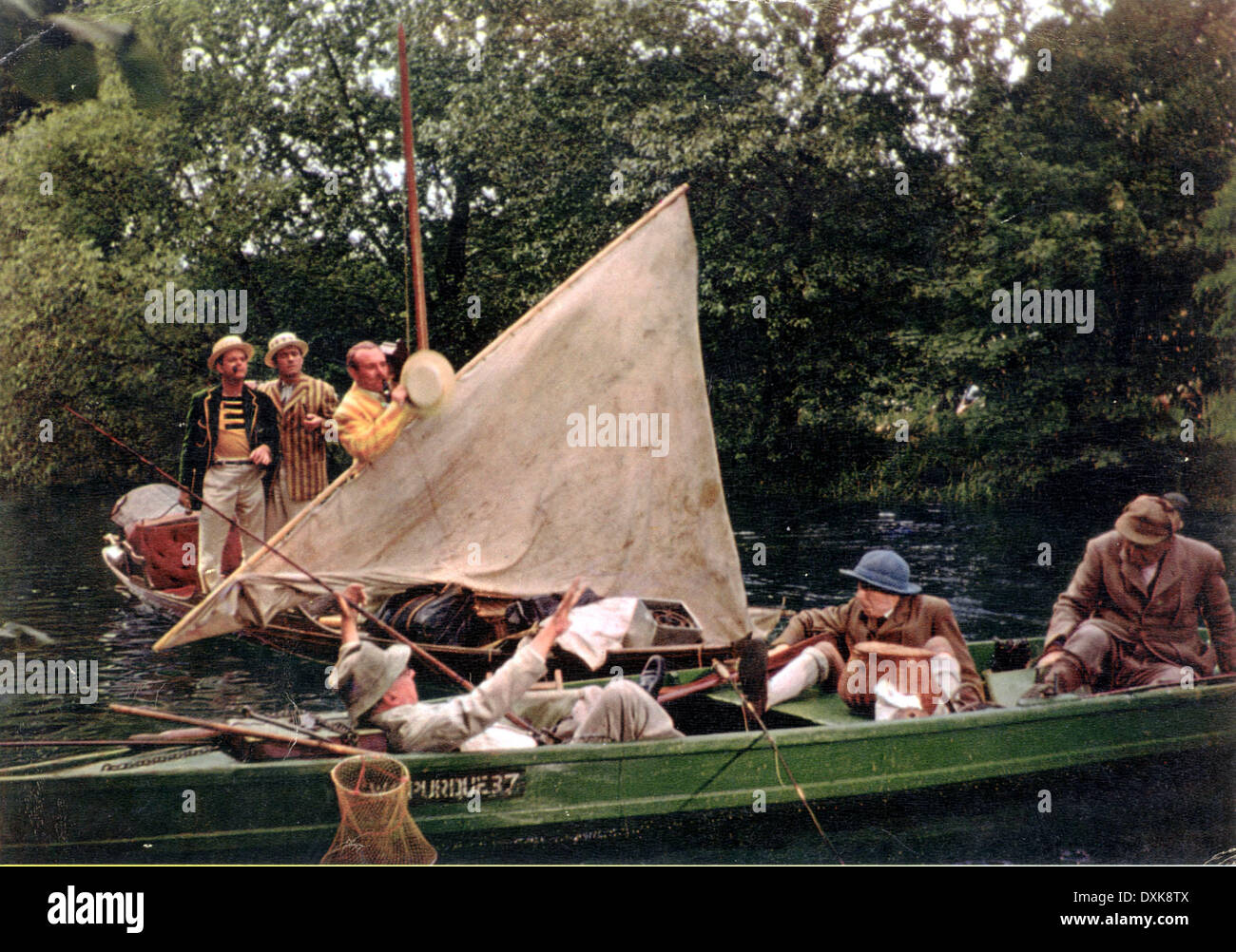 Three men in a boat stock photo alamy