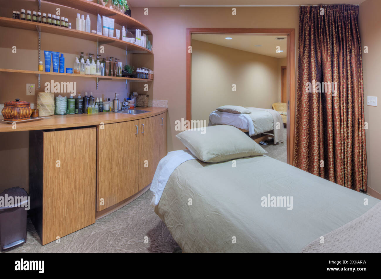 Massage table in beauty salon Stock Photo