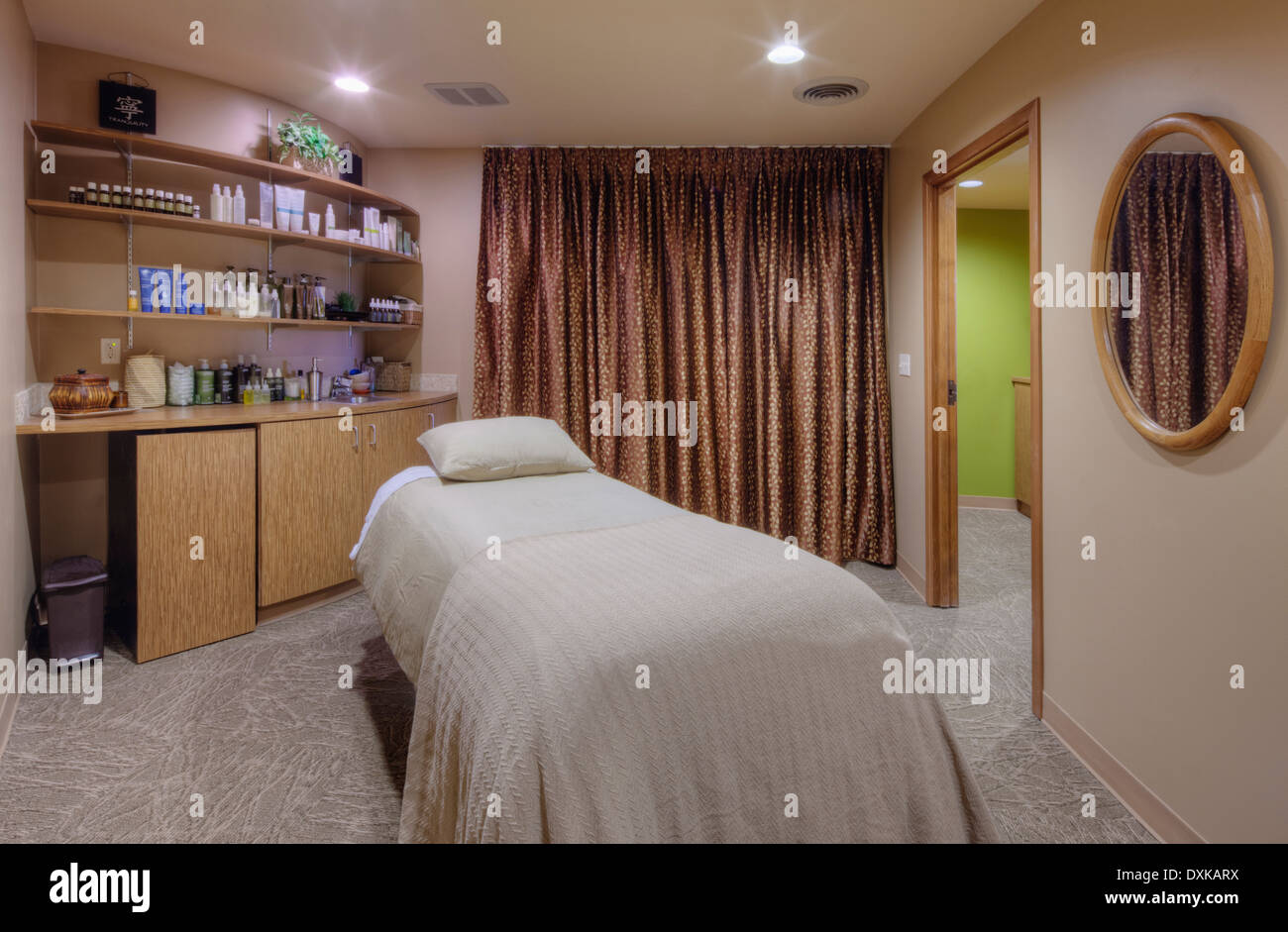 Massage table in beauty salon Stock Photo