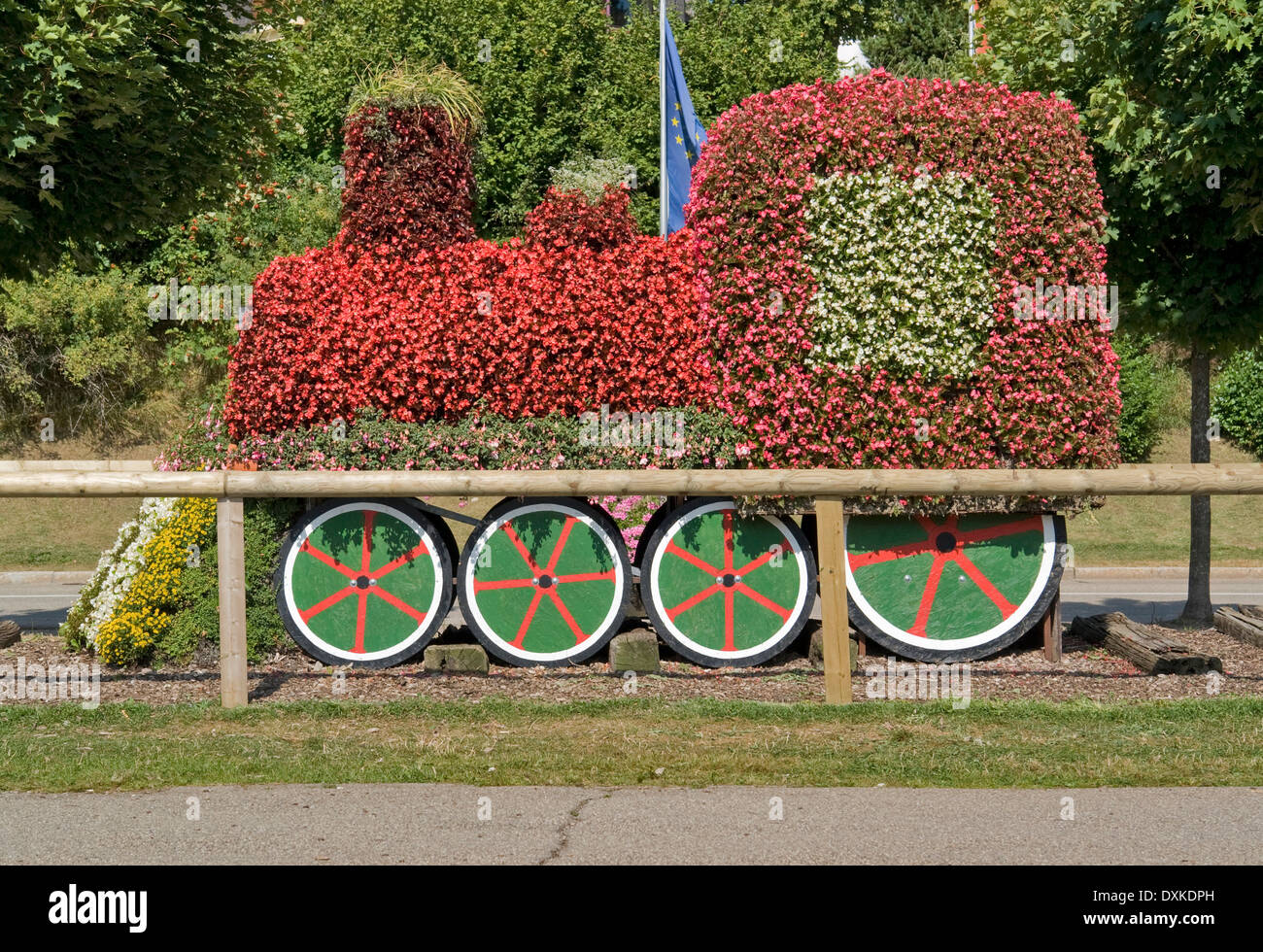 sideways shot of a decorative train made of flowers in the Black Forest (Southern Germany) at summer time Stock Photo