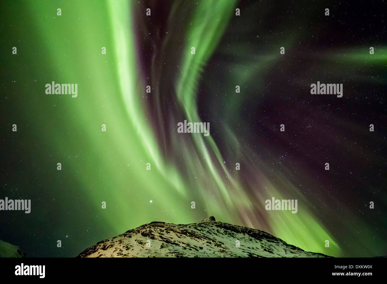 Aurora borealis or northern lights moving across night sky within the ...