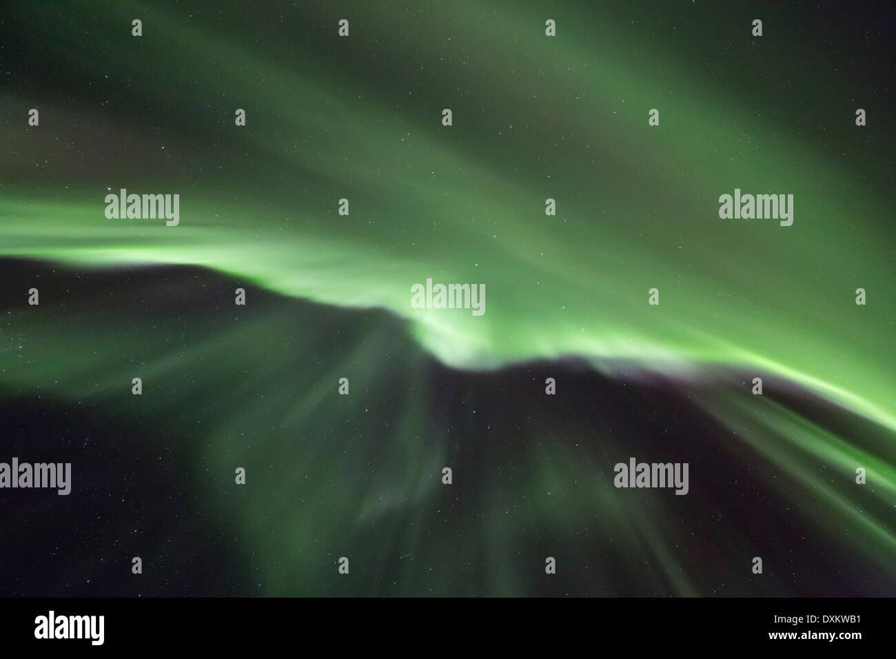 Aurora borealis or northern lights moving across night sky within the ...