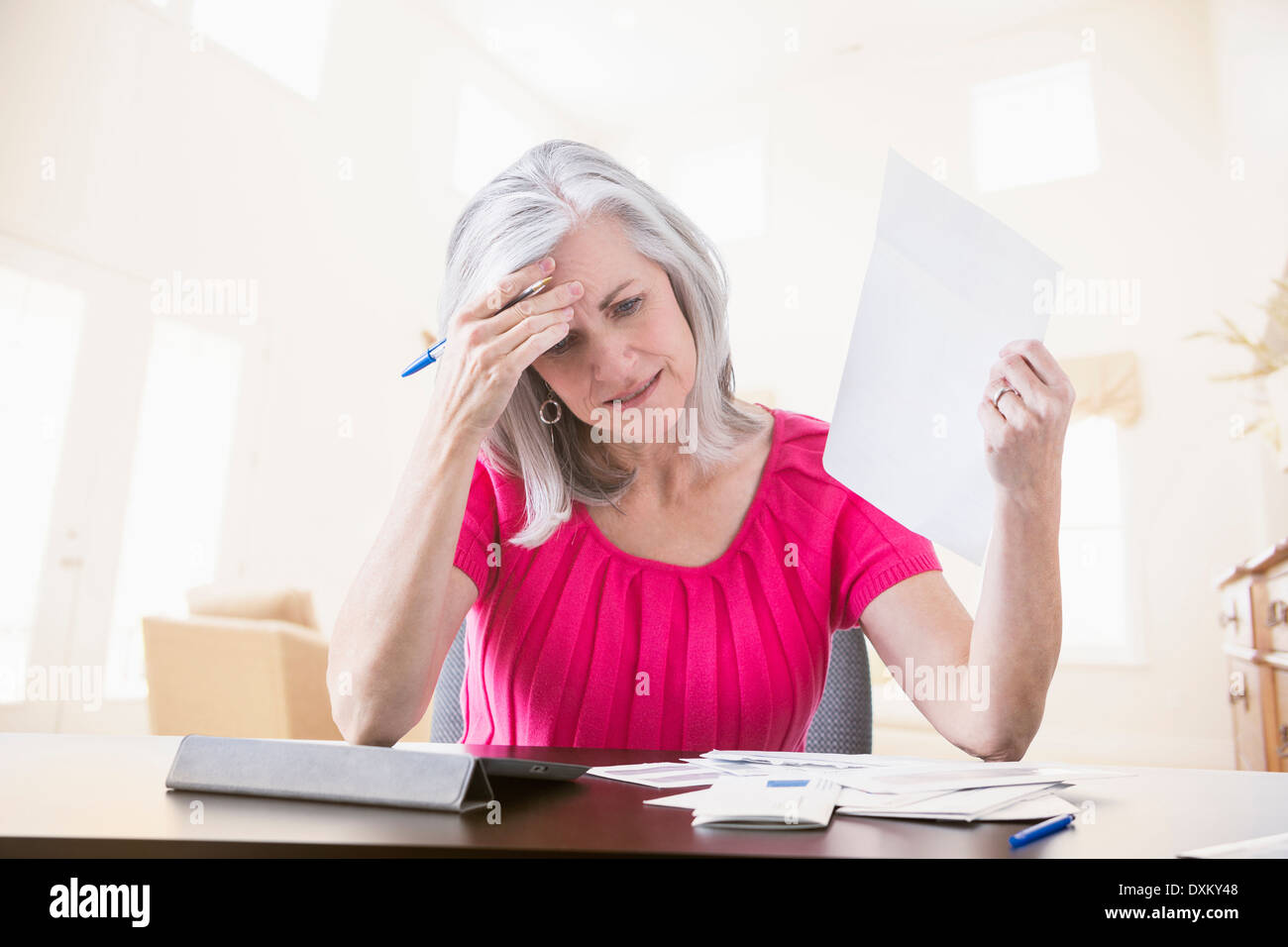 Woman frustrated mature indoors hi-res stock photography and images - Alamy