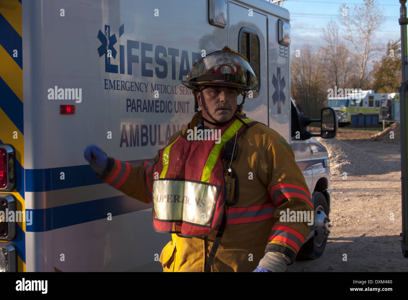 Fire engine responding to incident hires stock photography and images