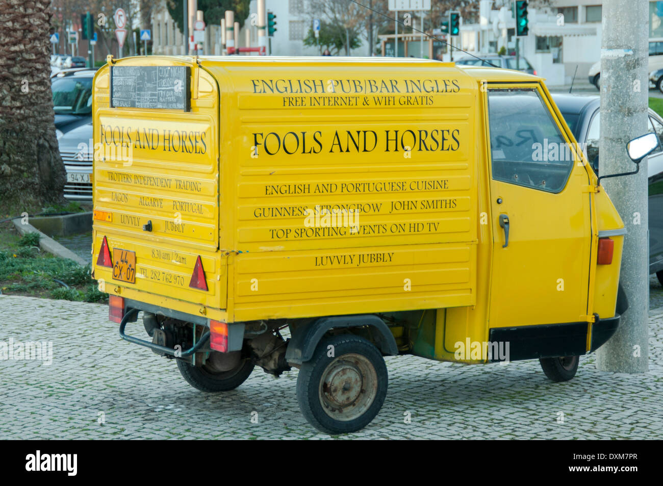 Yellow van for the 'Only Fools and Horses' pub in Lagos, Algarve Stock Photo