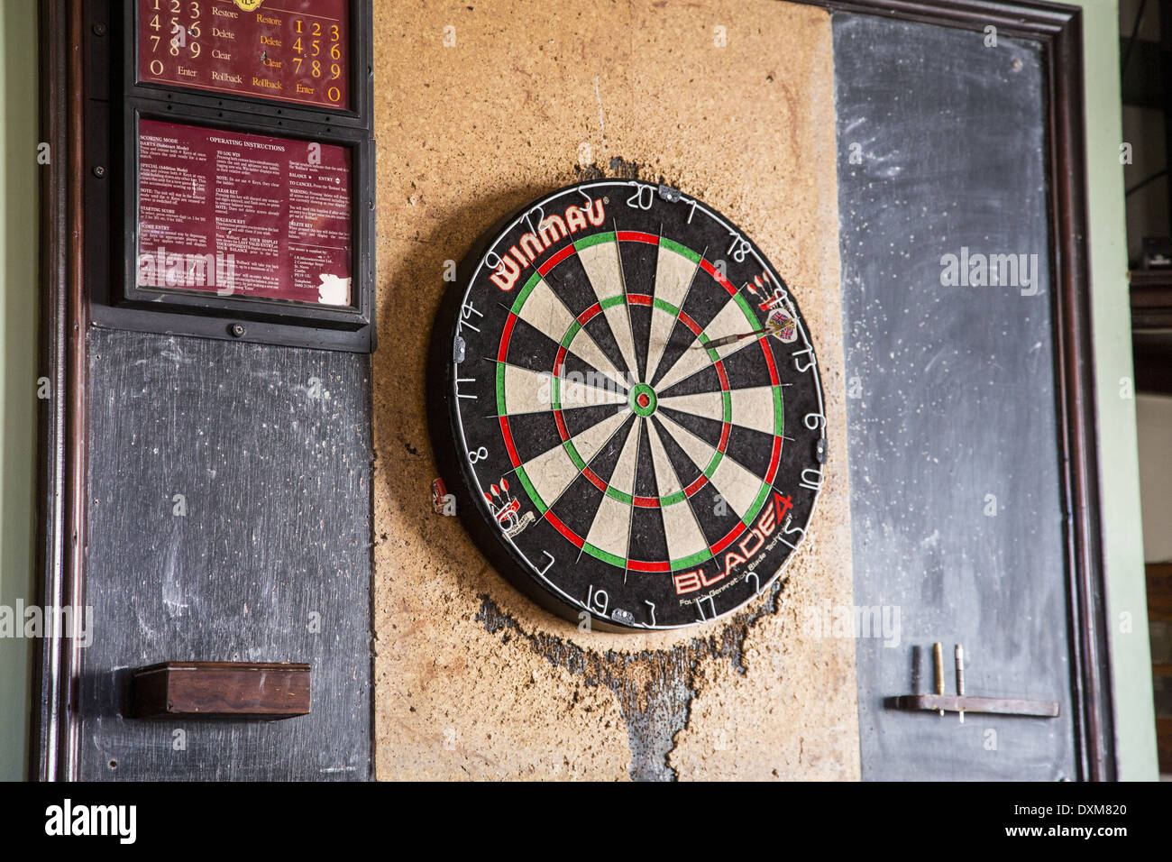 Dartboard in an English pub. Stock Photo