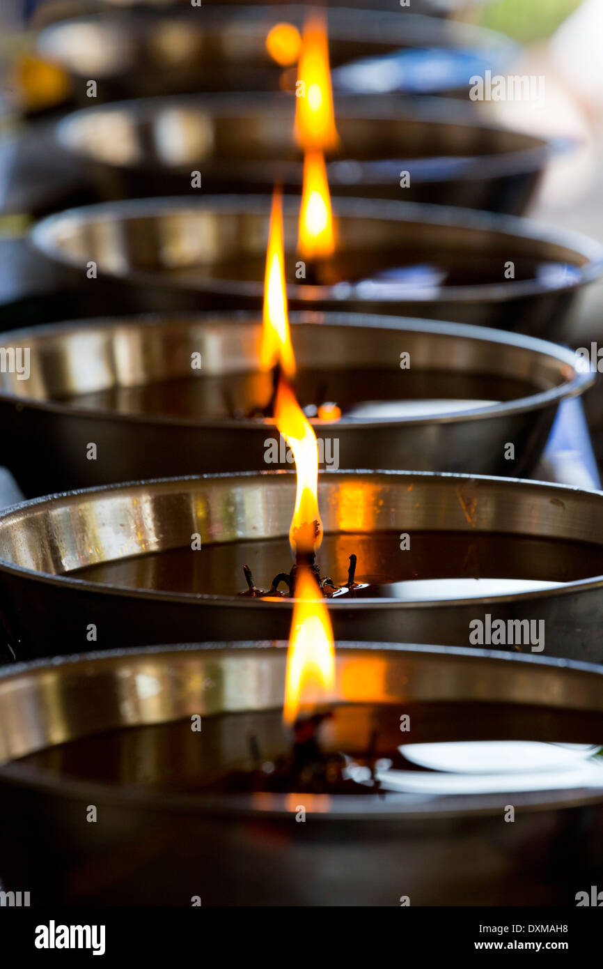Candle Lights in the Temple Wat Arun in Bangkok, Thailand Stock Photo