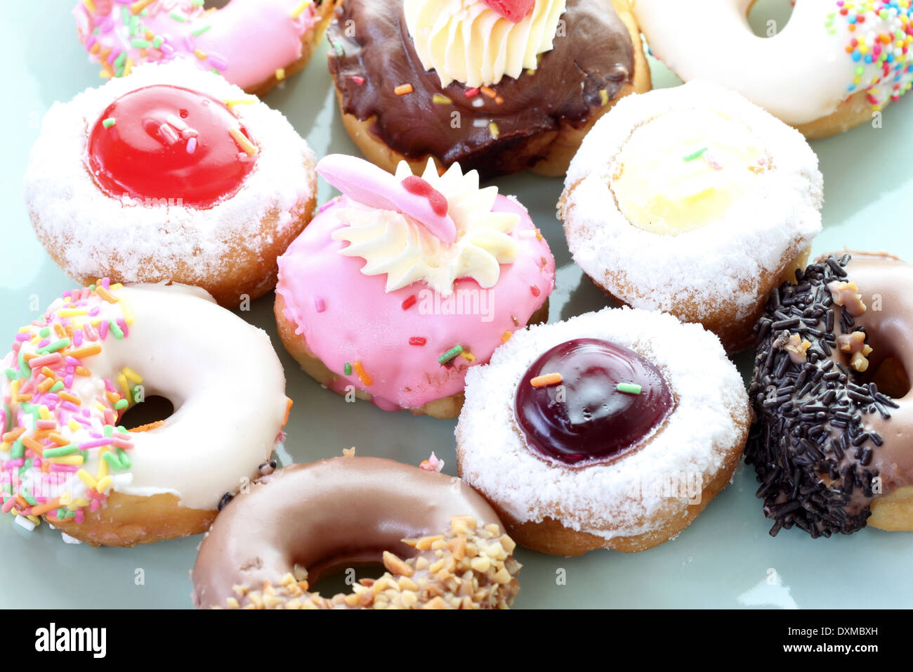 Many donuts in the dish with side by side. Stock Photo