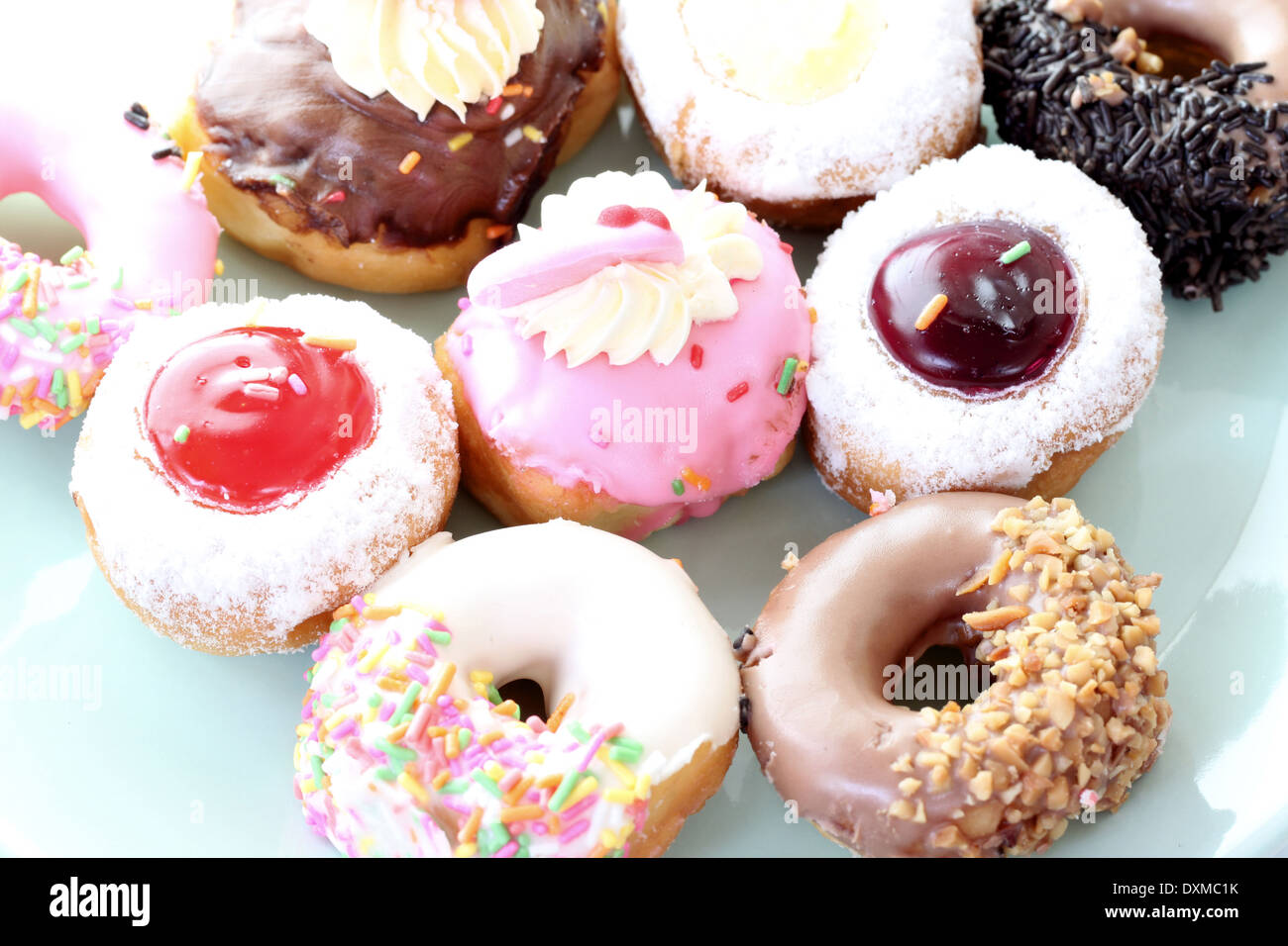 Many donuts in the dish with side by side. Stock Photo