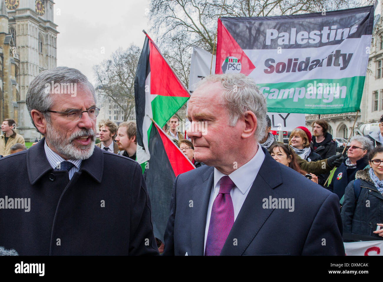 London, UK . 27th Mar, 2014. Gerry Adams and Martin McGuiness. Tony Benn's funeral at 11.00am at St Margaret's Church, Westminster. His body was brought in a hearse from the main gates of New Palace Yard at 10.45am, and was followed by members of his family on foot. The rout was lined by admirers. On arrival at the gates it was carried into the church by members of the family. Thursday 27th March 2014, London, UK. Credit:  Guy Bell/Alamy Live News Stock Photo