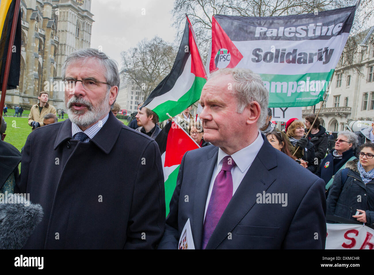 London, UK . 27th Mar, 2014. Gerry Adams and Martin McGuiness. Tony Benn's funeral at 11.00am at St Margaret's Church, Westminster. His body was brought in a hearse from the main gates of New Palace Yard at 10.45am, and was followed by members of his family on foot. The rout was lined by admirers. On arrival at the gates it was carried into the church by members of the family. Thursday 27th March 2014, London, UK. Credit:  Guy Bell/Alamy Live News Stock Photo
