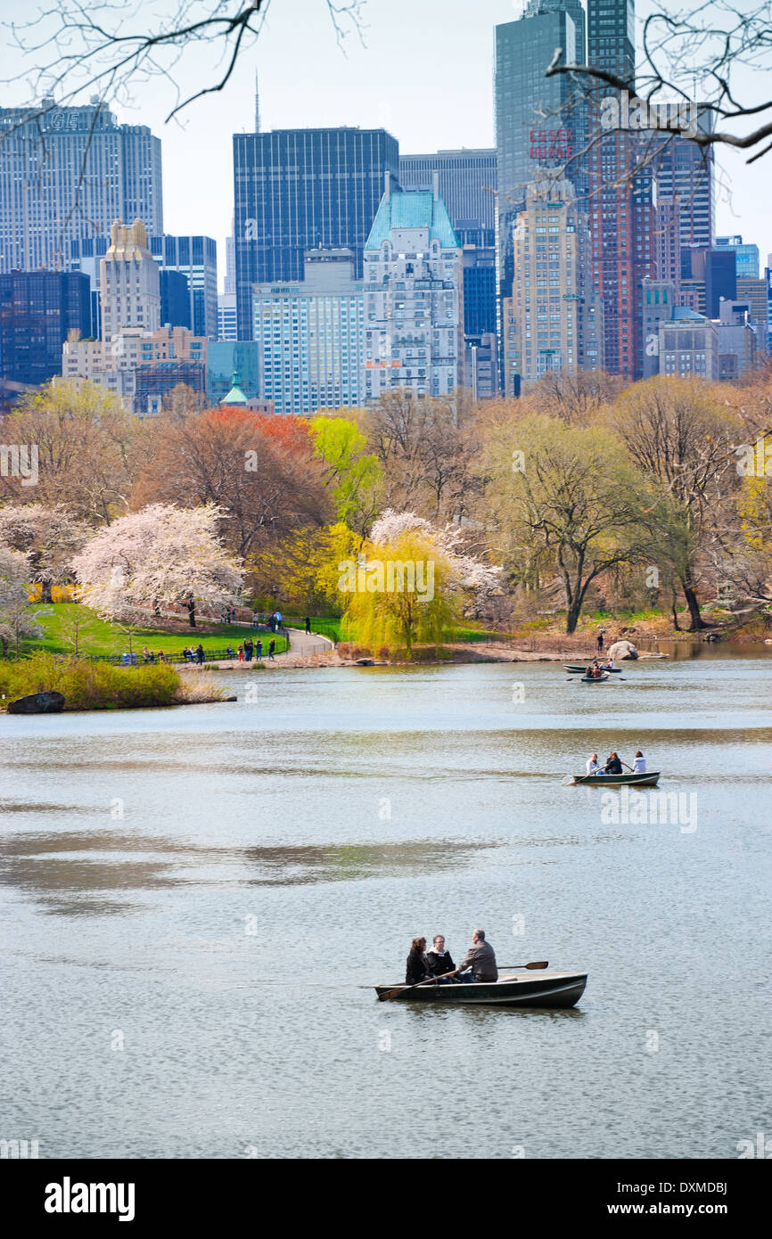Visitors boating on The Lake with the Central Park South Skyline in the background Stock Photo