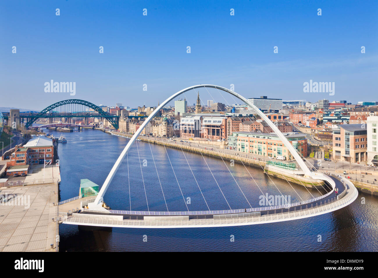 gateshead Millennium bridge and Tyne bridge over River Tyne Newcastle upon Tyne skyline Tyne and Wear England UK GB EU Europe Stock Photo