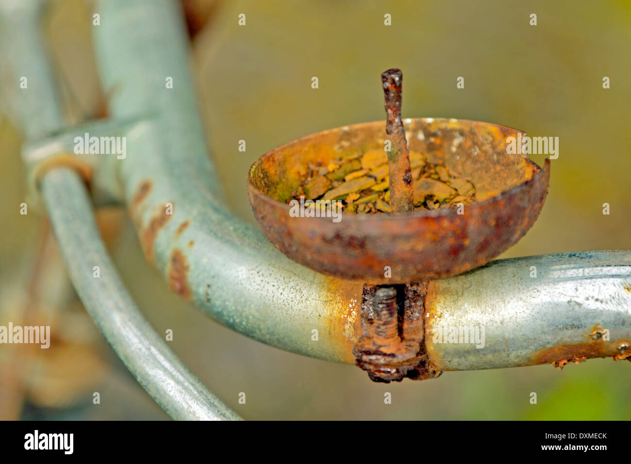 Rusty bicycle bell on unfocused background. Stock Photo