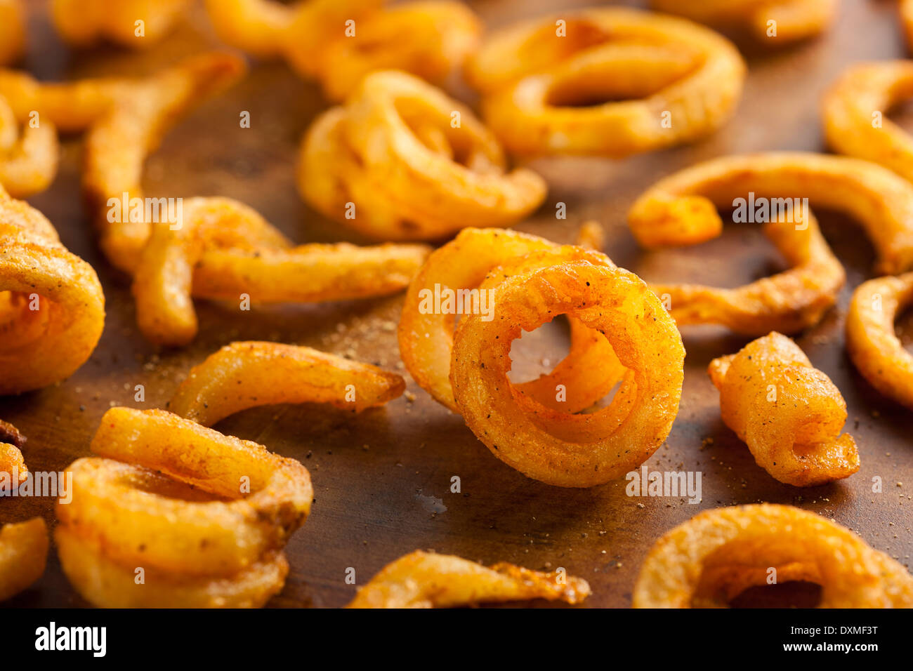 Spicy Seasoned Curly Fries Ready to Eat Stock Photo Alamy