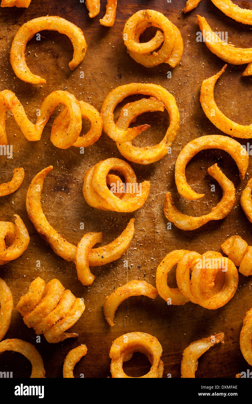 Spicy Seasoned Curly Fries Ready to Eat Stock Photo