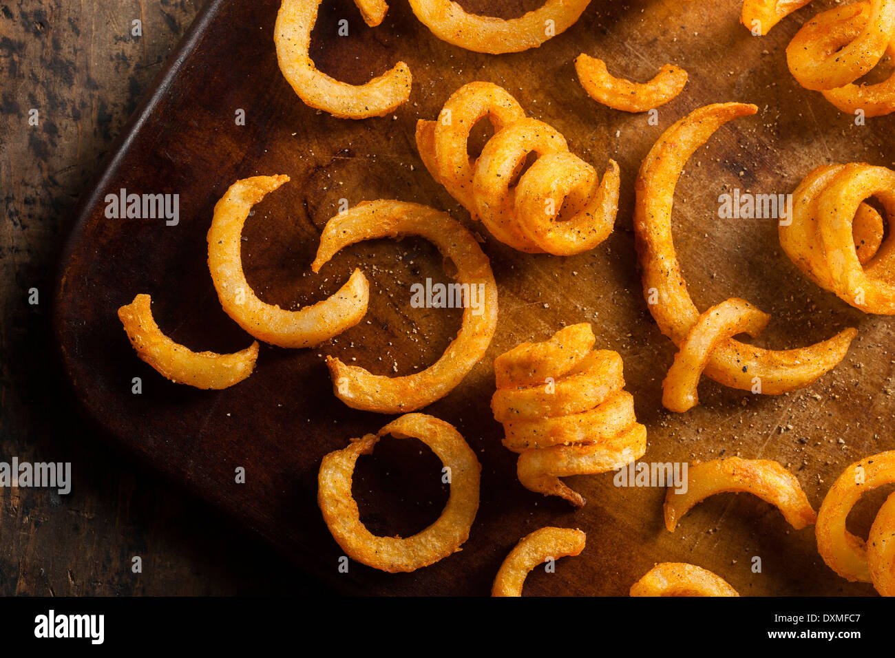 Spicy Seasoned Curly Fries Ready to Eat Stock Photo