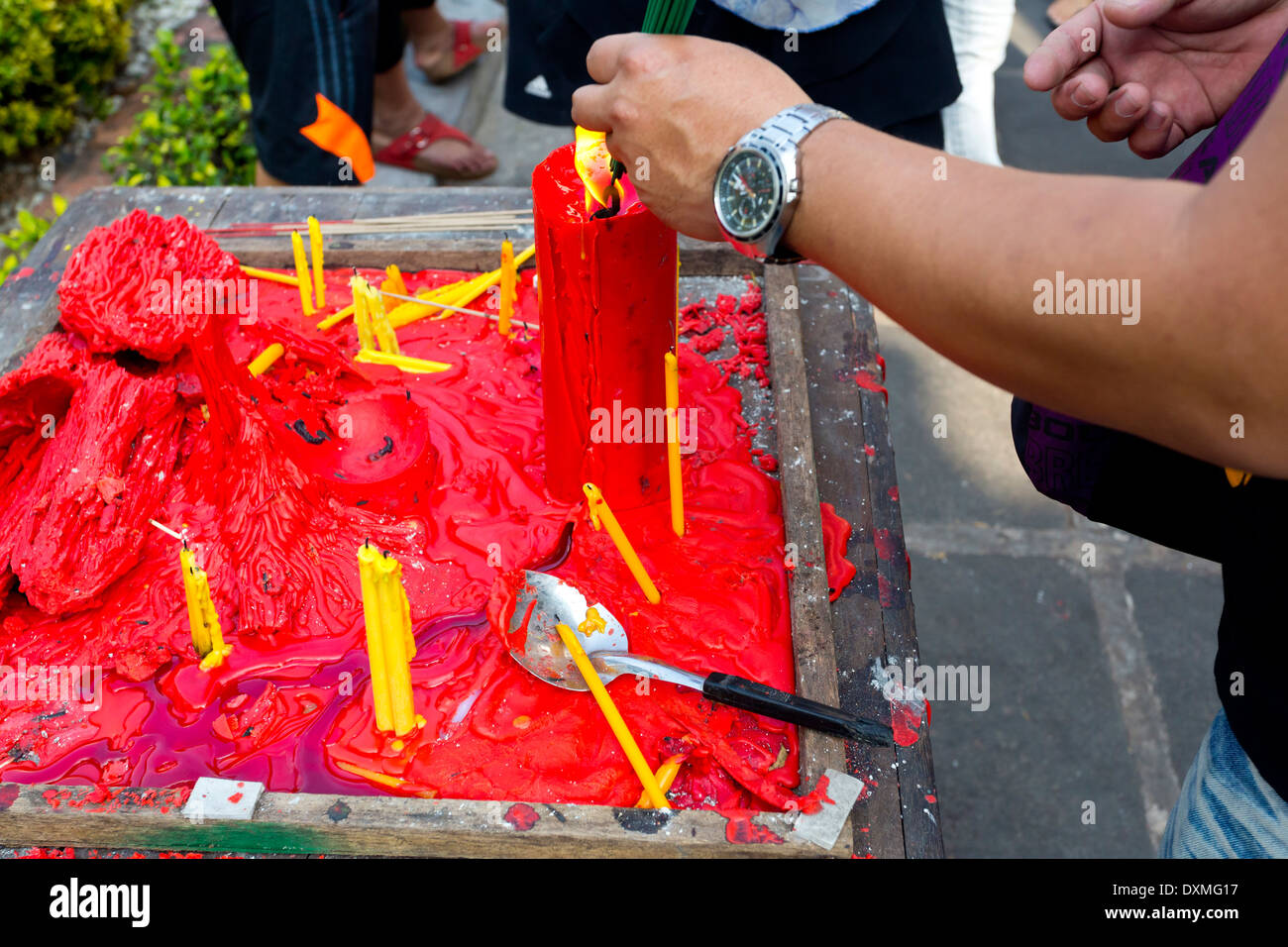 Candle Lights in the Temple Wat Arun in Bangkok, Thailand Stock Photo
