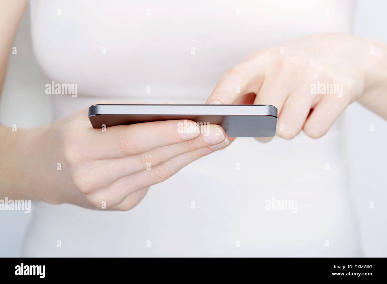 Modern woman using smartphone hi-res stock photography and images - Alamy