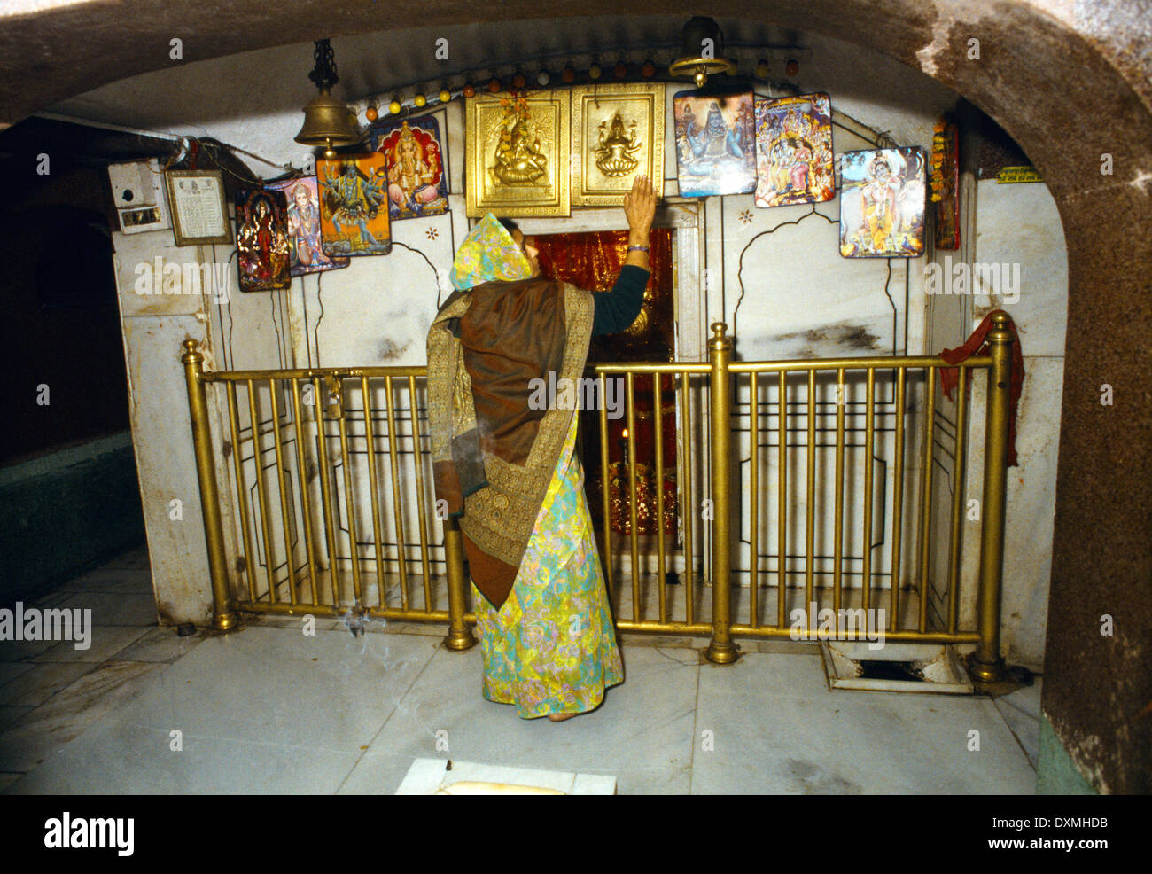 Amritsar India Langa Wali Devi - Woman Worshipping - Small Shrine Stock Photo