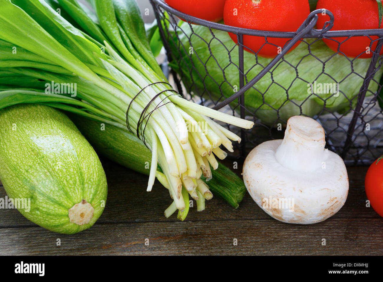 fresh vegetables on the table and in basket Stock Photo