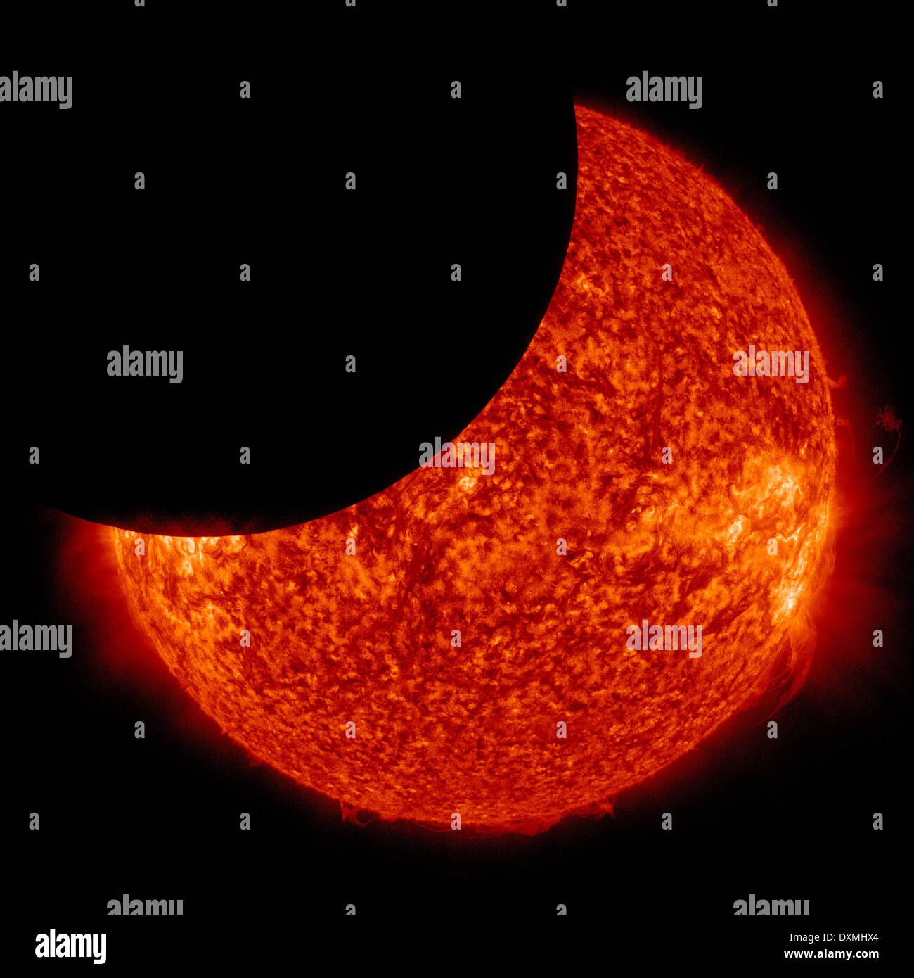 Partial solar eclipse seen from space Stock Photo