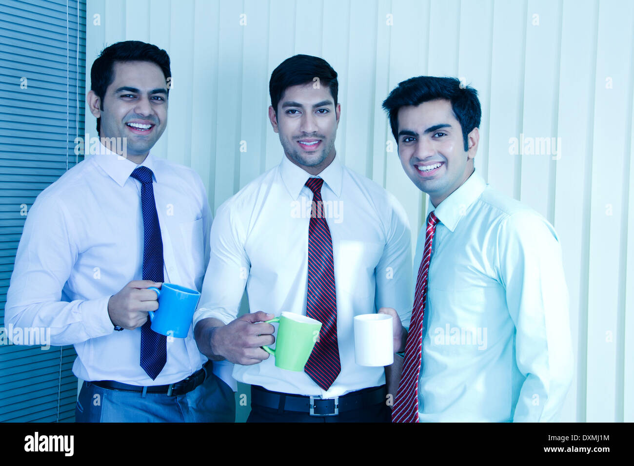 Indian BusinessMen Drinking Tea and talking Stock Photo