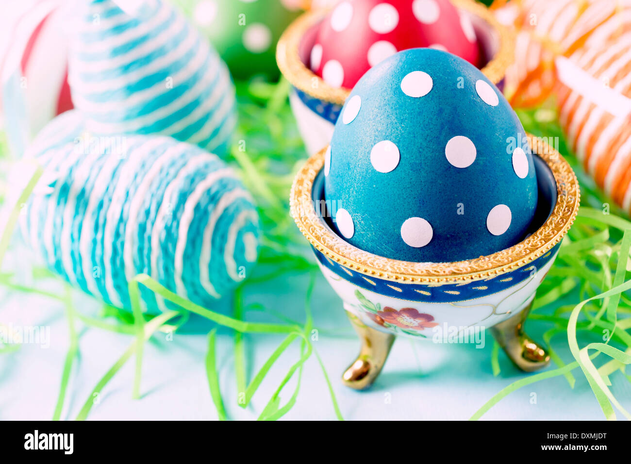 Selective focus on the front dotted blue egg  Stock Photo