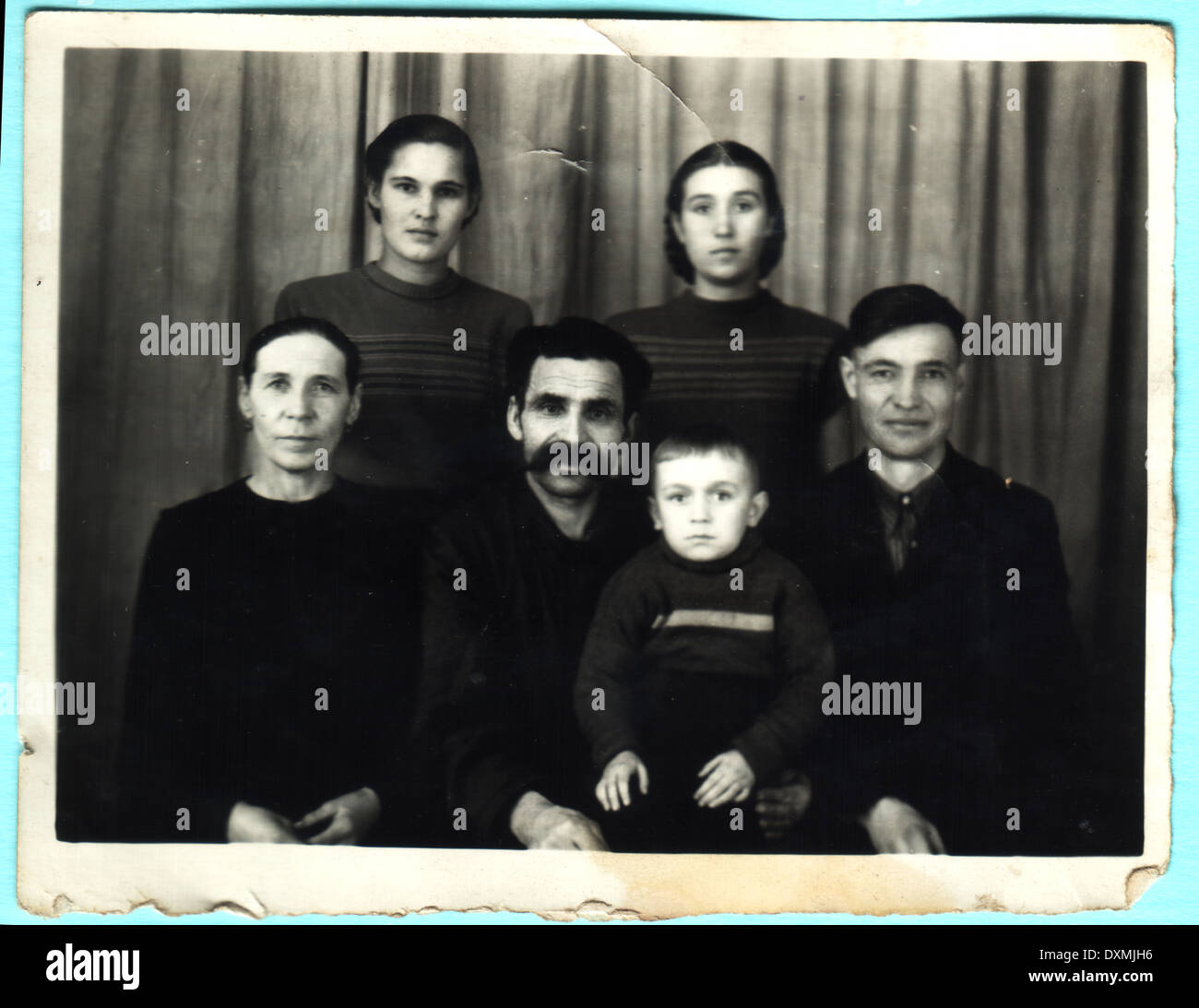 USSR - CIRCA 1950s: An antique photo shows family portrait Stock Photo