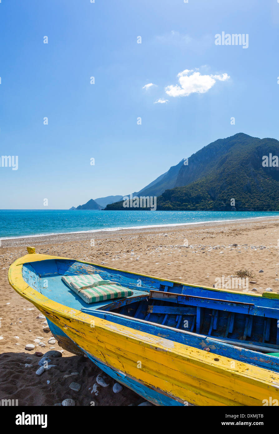 Beach in the quiet resort of Cirali looking towards the ruins at Olympos, Kemer District, Antalya Province, Turkey Stock Photo