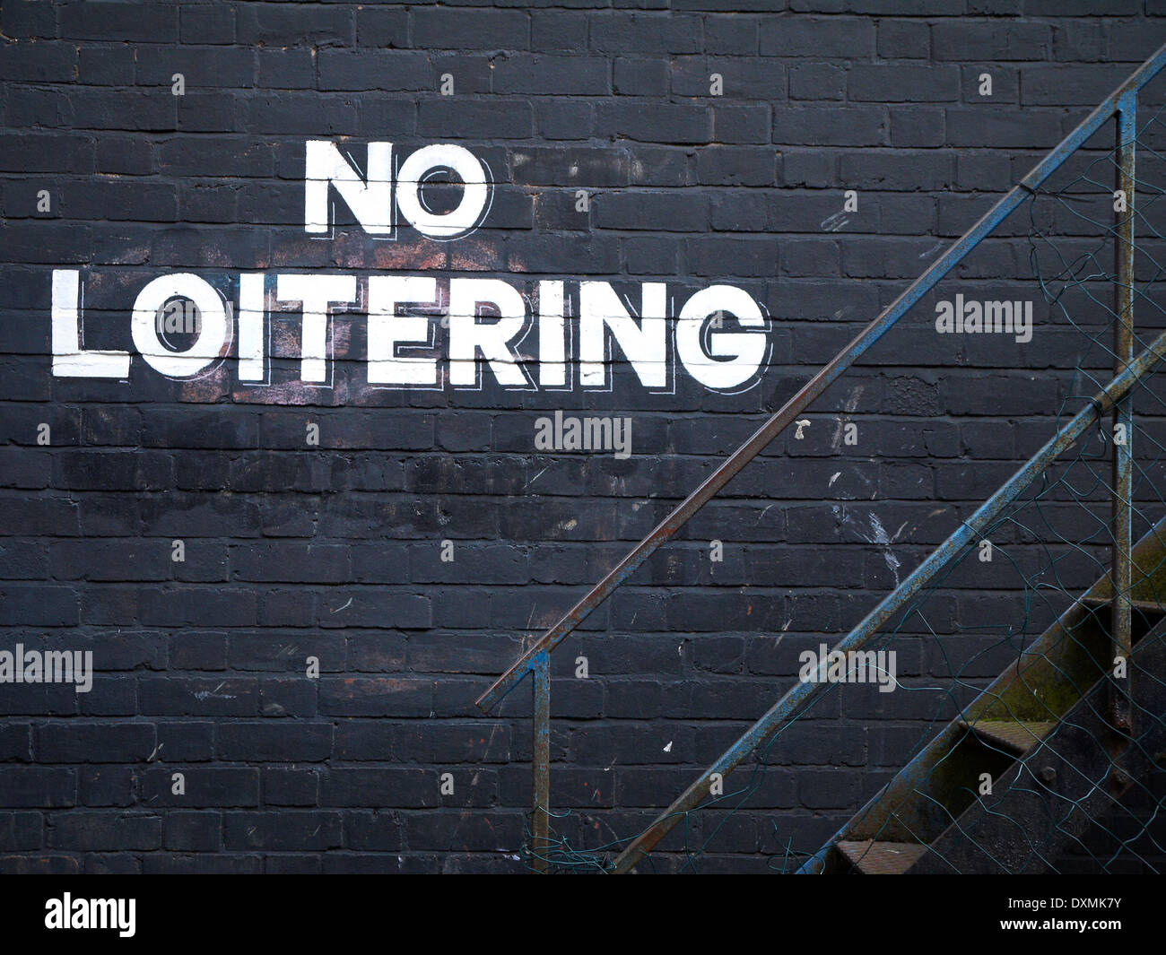 No Loitering warning on wall in Manchester UK Stock Photo