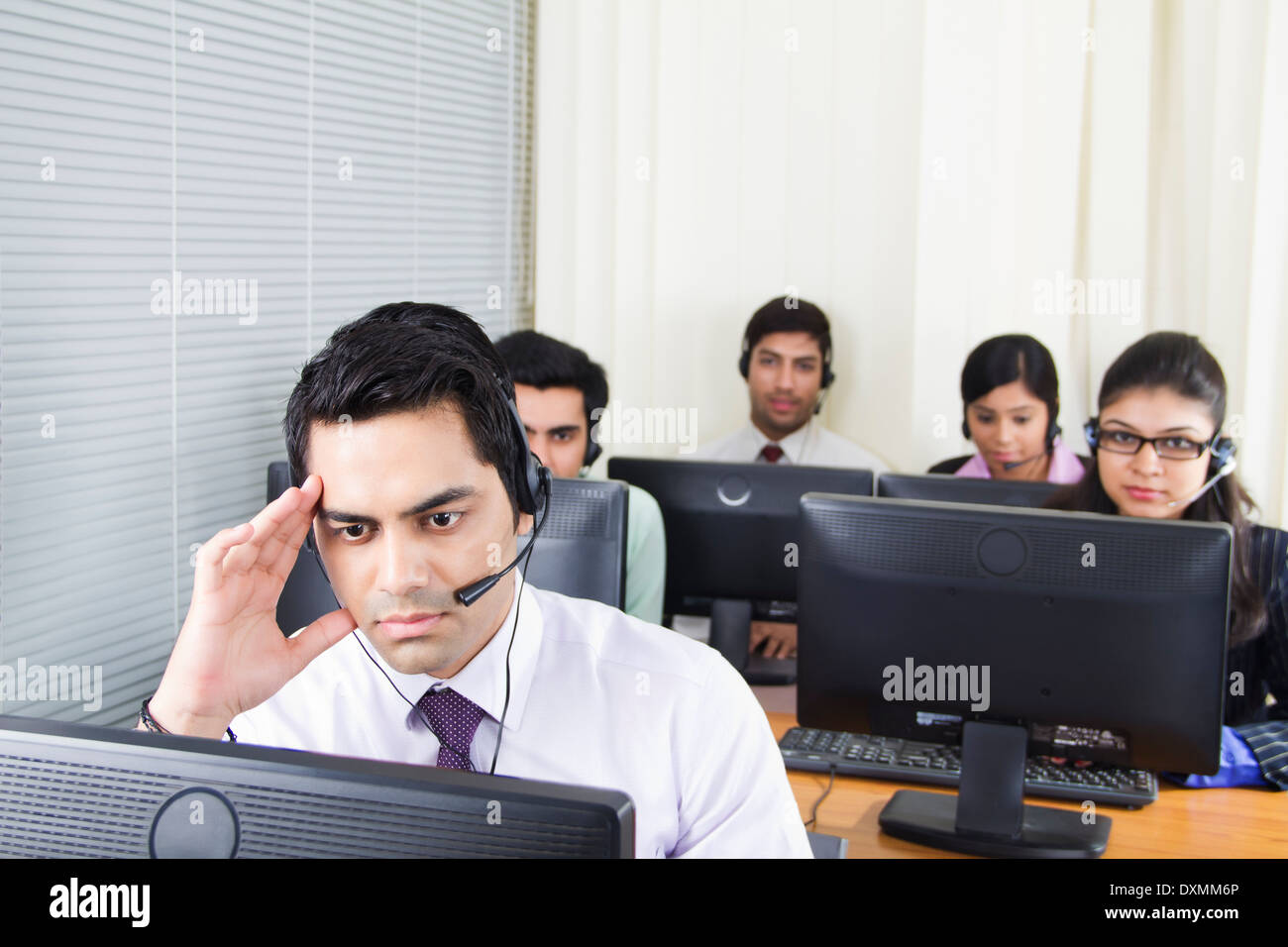 Indian Business People Working in  call centre Stock Photo