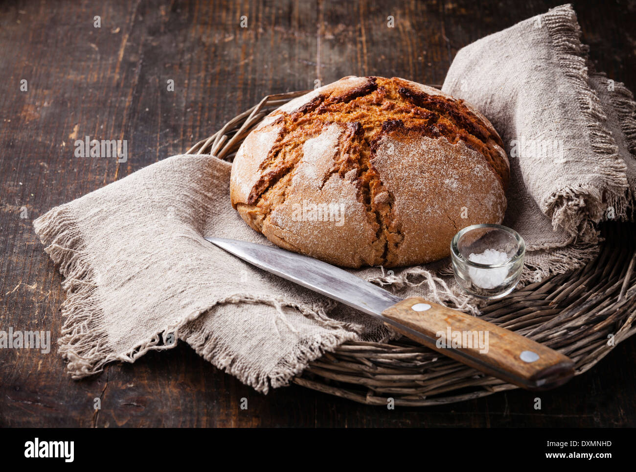 Fresh bread on wooden table Stock Photo