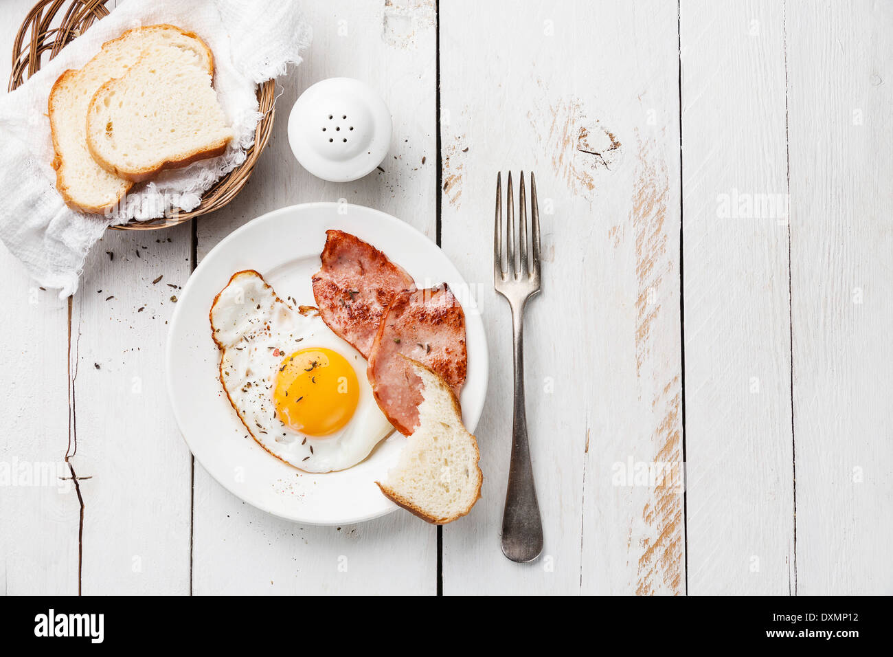 Fried egg with grilled sausage for breakfast Stock Photo
