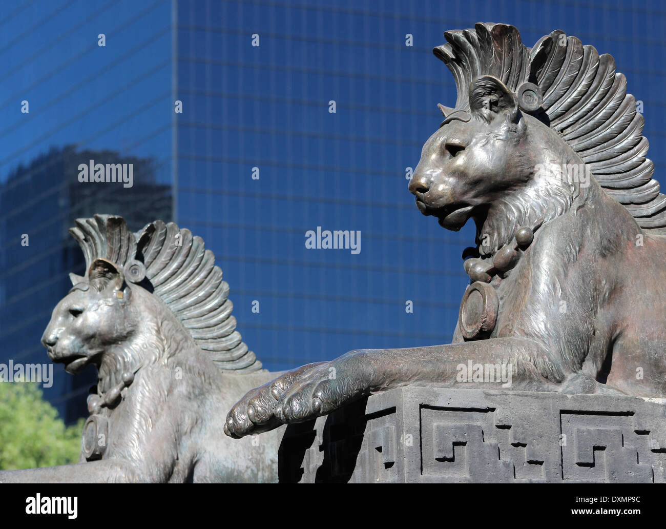 Two of the bronze leopards with feathered headdresses at the base of the Monument to Cuautemoc, Paseo de la Reforma, Mexico City Stock Photo