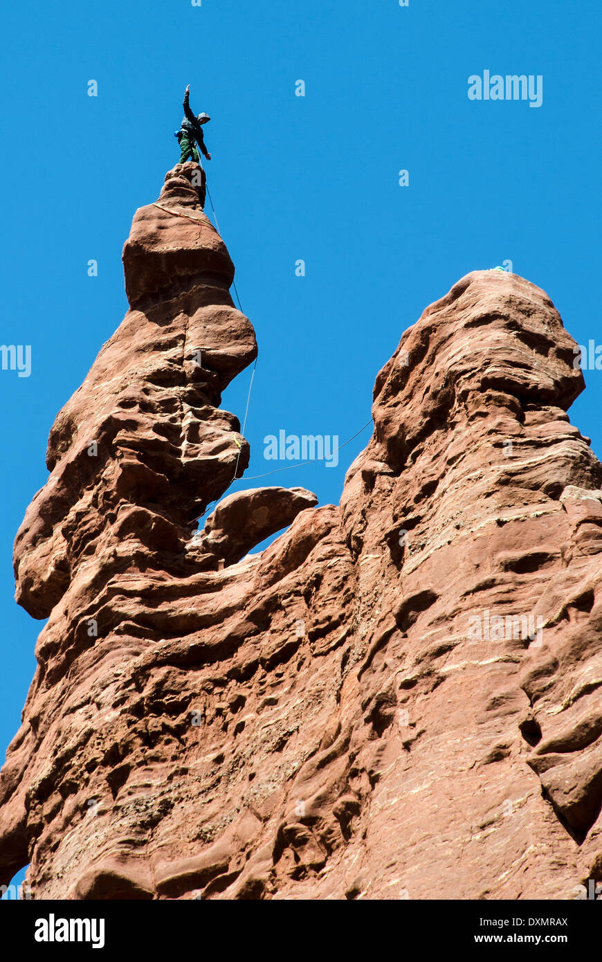 Rock Climbers on Fisher Towers Moab Utah USA Stock Photo