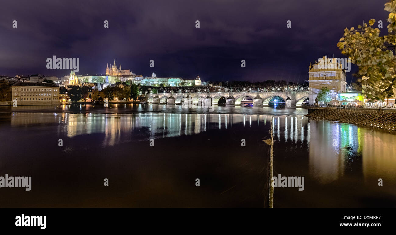 Prague Castle in the night and Charles bridge Stock Photo