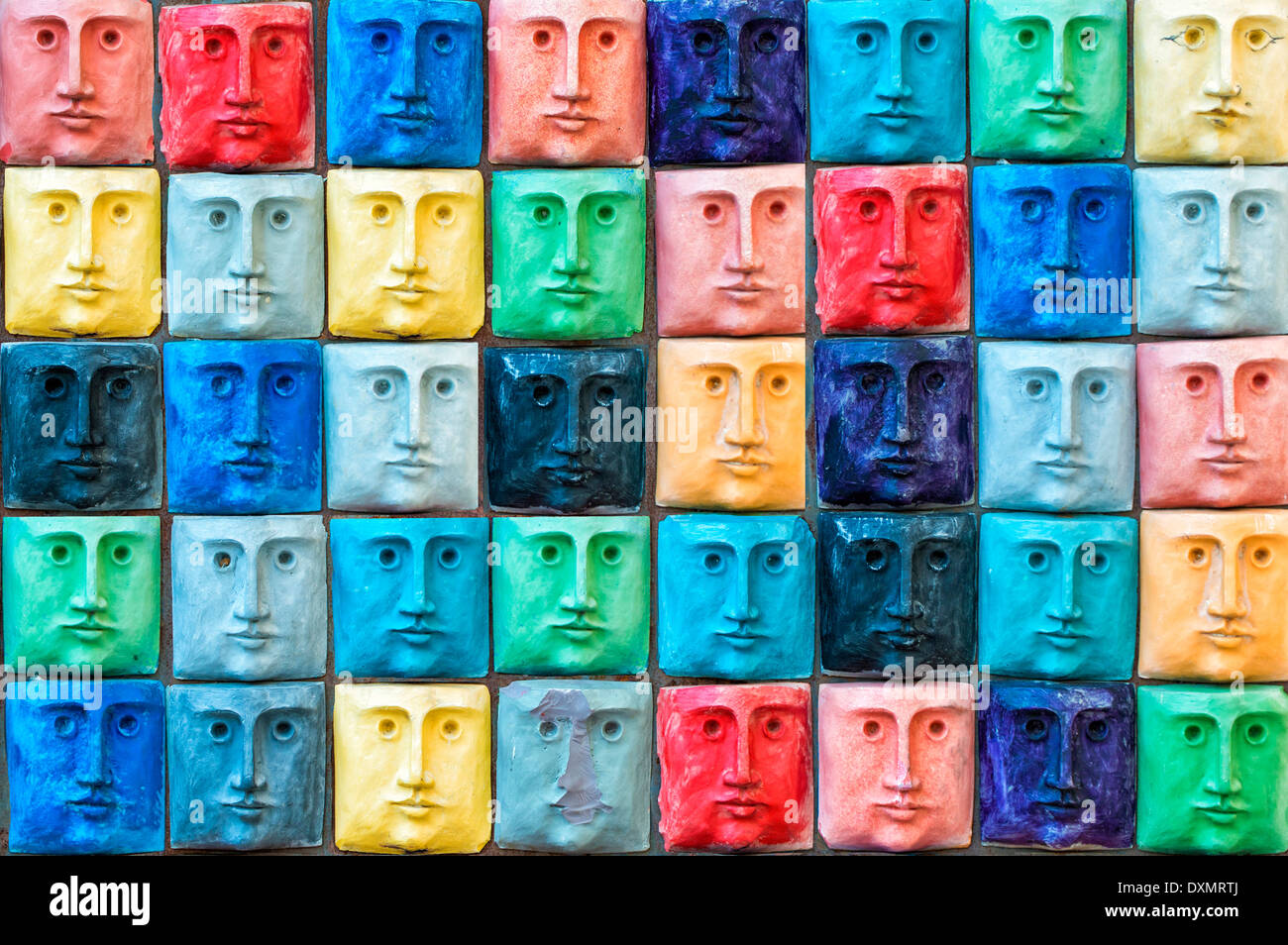 Pattern of tiles representing faces, Aveiro, Beira, Portugal Stock Photo