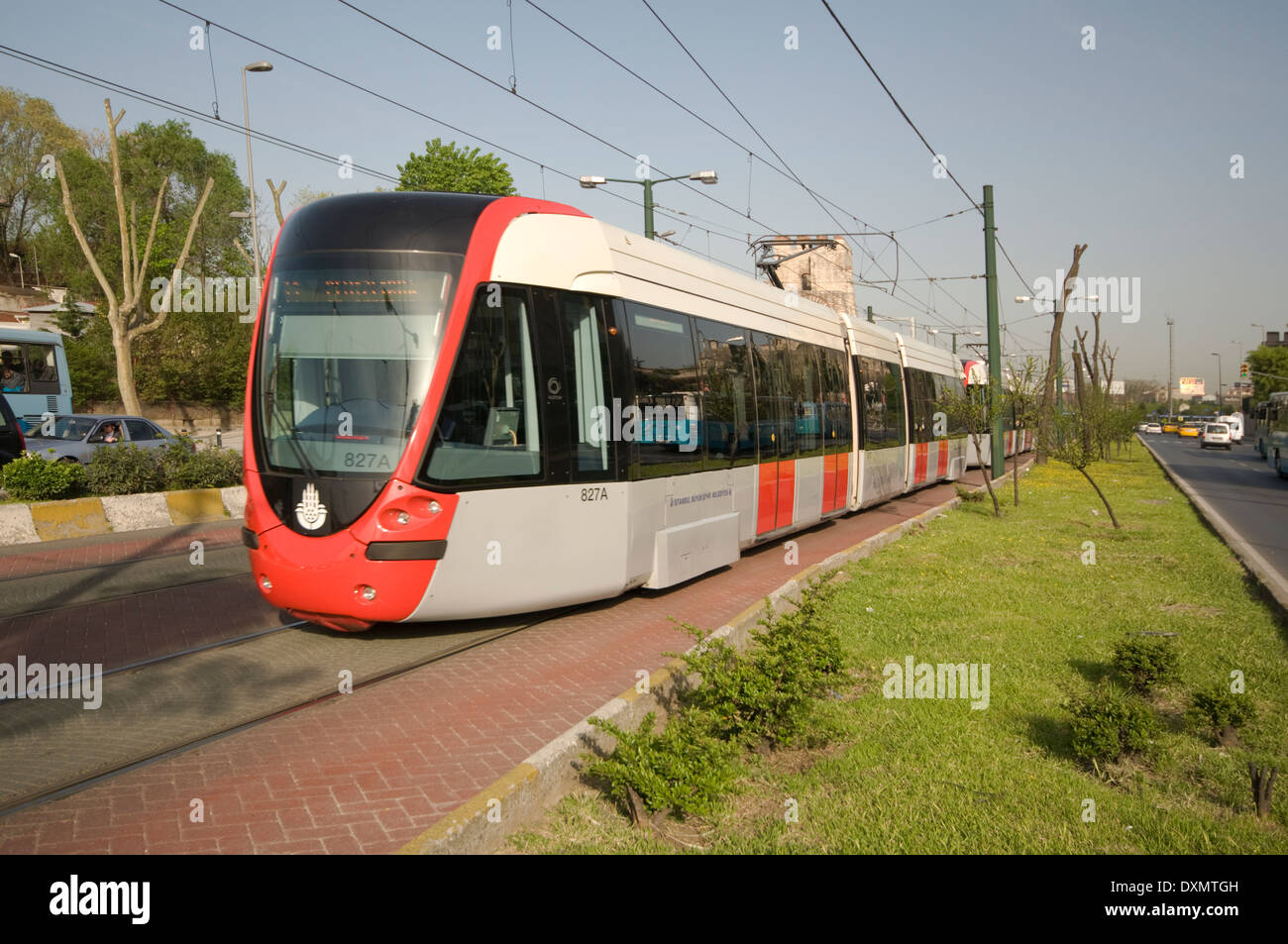 EUROPE/ASIA, Turkey, Istanbul, modern tram system next to road Stock Photo