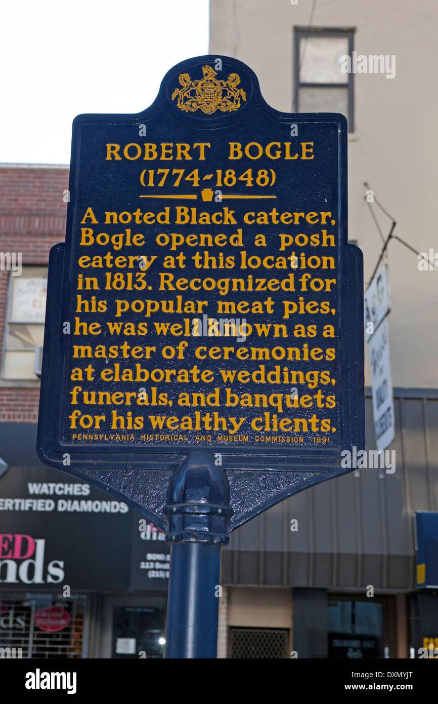 ROBERT BOGLE (1774-1848) A noted Black caterer, Bogle opened a posh eatery at this location in 1813. Recognized for his popular meat pies, he was well known as a master of ceremonies at elaborate weddings, funerals, and banquets for his wealthy clients. Pennsylvania Historical and Museum Commission, 1991 Stock Photo