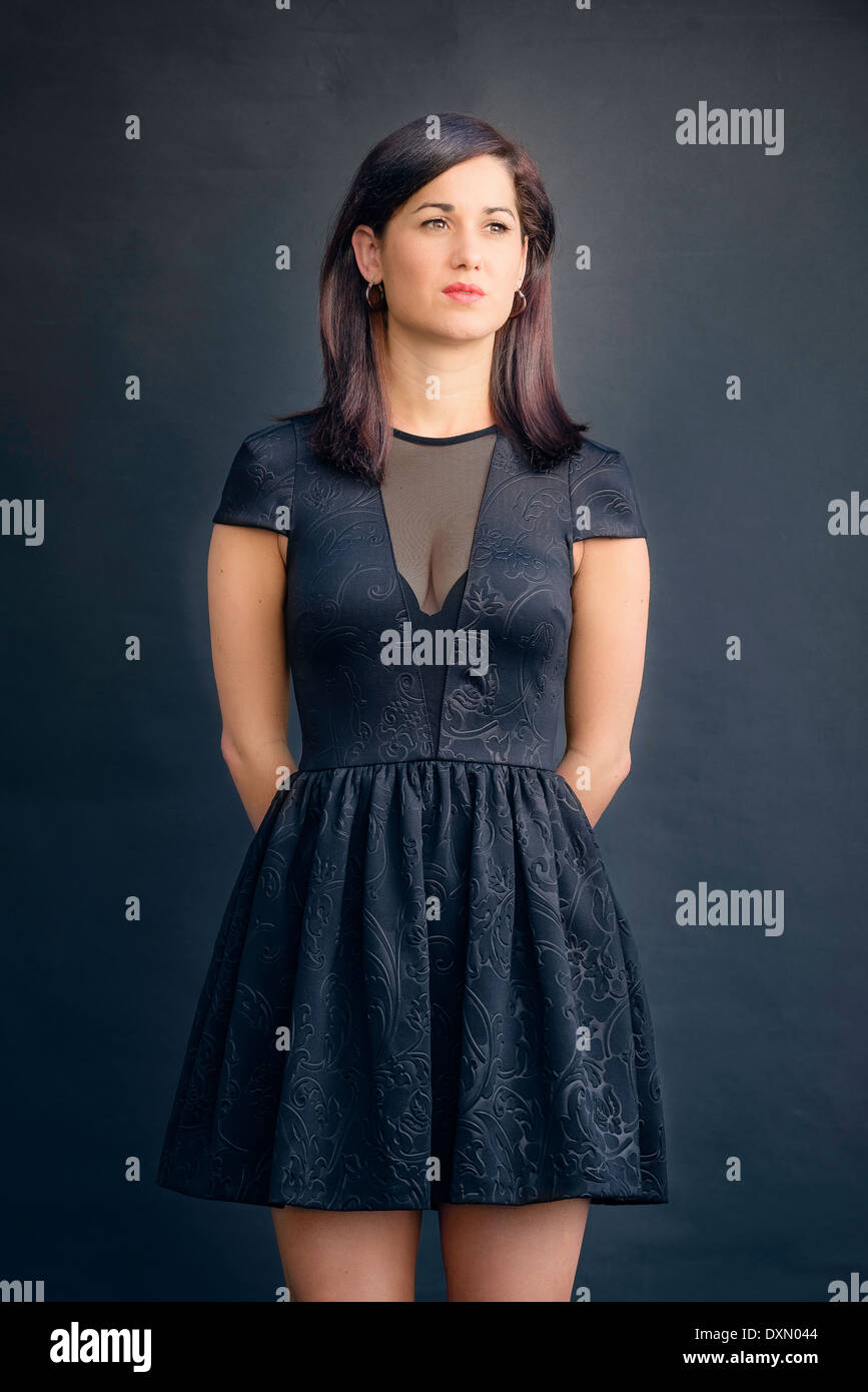 Model wearing a short black dress Stock Photo