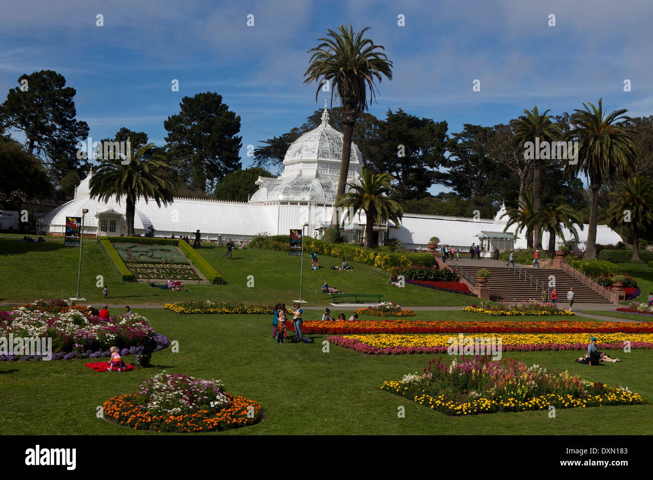 People sitting in the yard in front the Conservatory of Flowers, Golden Gate Park, San Francisco, California, United States of America Stock Photo