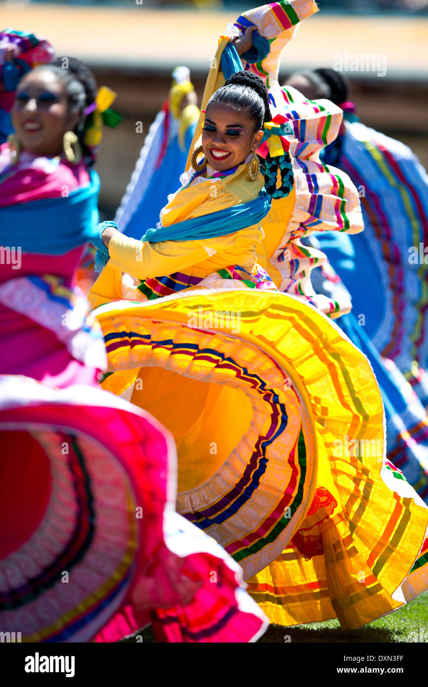 A group of Mexican folk dancers performs a traditional dance Stock Photo