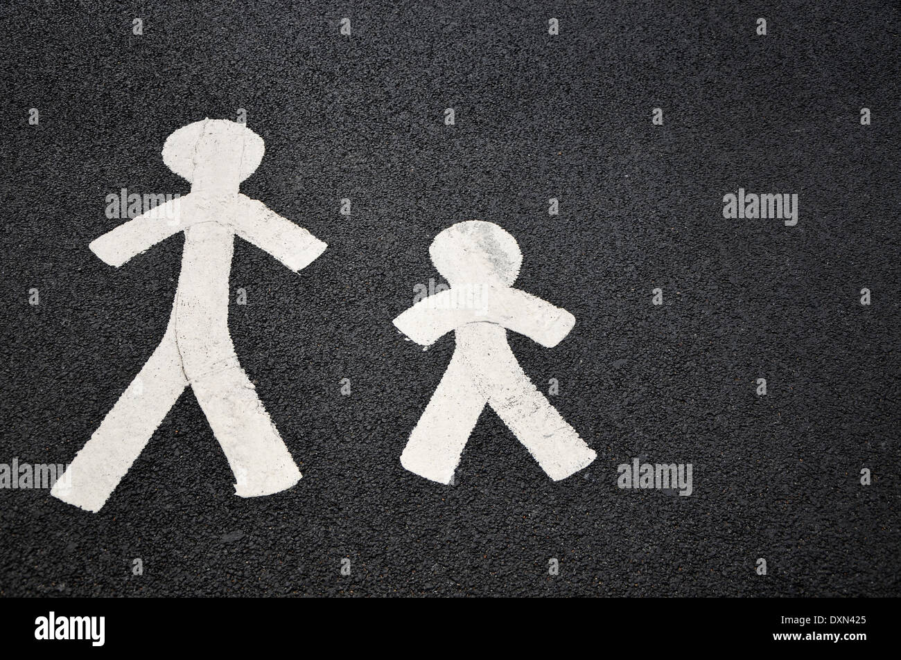 Parent and child road surface markings for parking spaces. Stock Photo