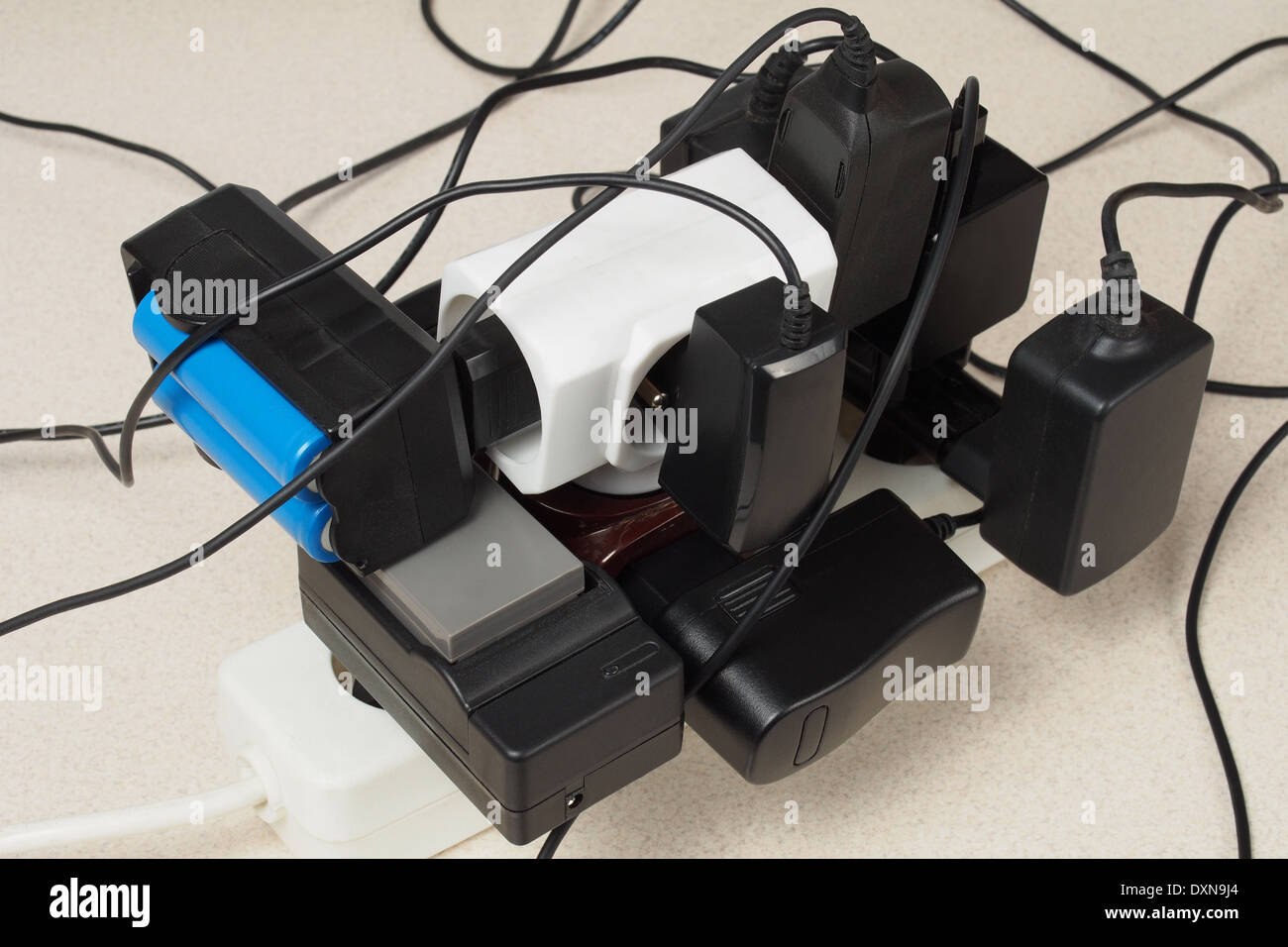 Battery chargers and extension cord Stock Photo Alamy